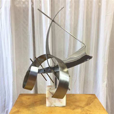 sheet metal sculpture art|contemporary metal art sculptures.